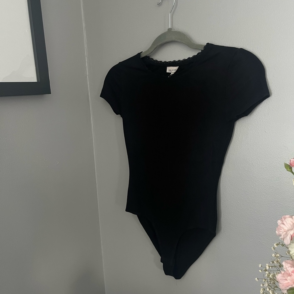Self <3 e black fitted bodysuit 🎶